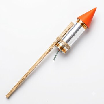 orange tipped sky rocket firework with wooden stick