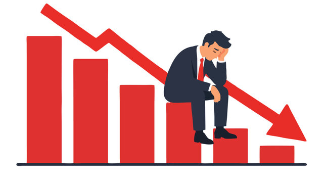Depressed unemployed businessman in dark suit sitting with head in hand on falling red bar graph with downward arrow illustrating financial loss, bankruptcy and economic crisis concept