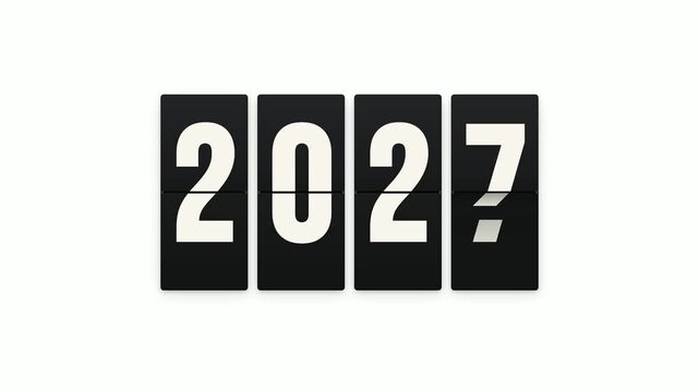 Mechanical flip board scoreboard showing year 2027 with question mark flap