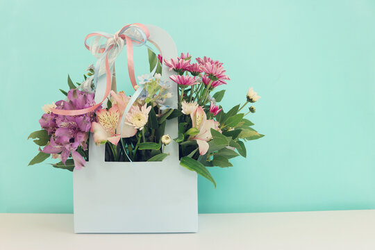 image of romantic and delicate flowers on pastel background
