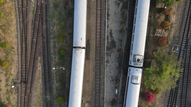 Aerial Footage of Passenger Train Carriages Lined Up at Purwokerto Railway Station in the Morning, Central Java, Indonesia.