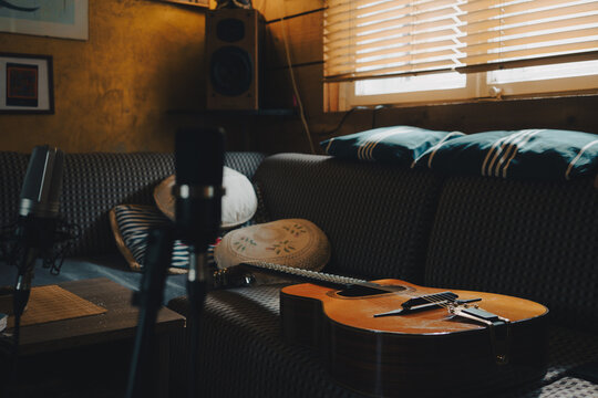 Gypsy jazz acoustic guitar in the living room with two microphones