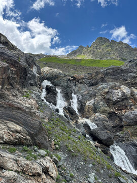 Cascading waterfall over rocks, Caucasus, Russia