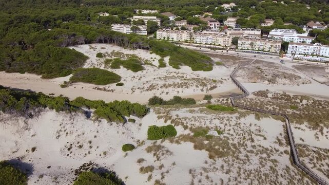 The town and the beach of the Cala Mesquida