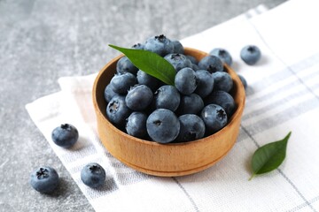 Bowl with fresh blueberries on the table © Sunlight