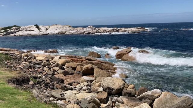 Rugged granite boulder shoreline and small islands near Bicheno on Tasmania's east coast