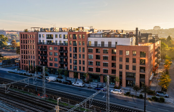 Modern Industrial Brick Apartment Building at Sunrise