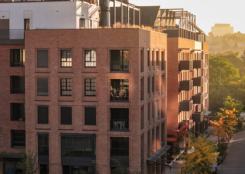 Modern Industrial Brick Apartment Building at Sunrise