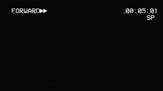 Old damaged vhs forward playback with analog noise glitch