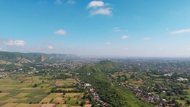 ush Agricultural Fields Surrounding a Rural Settlement in the Aravalli Region of Rajasthan