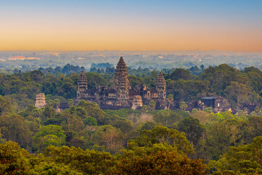 Elevated View of Angkor Wat Temple Rising Above the Jungle Canopy