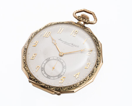 IWC hand-wound pocket watch, 1920s, 14kt yellow gold case with white dial. Milan, Italy, April 27, 2025