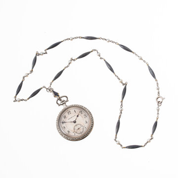 Vintage Pendentif pendant watch, 1940s, 18kt gold case with diamonds, pearls and enamel. Milan, Italy, August 23, 2025