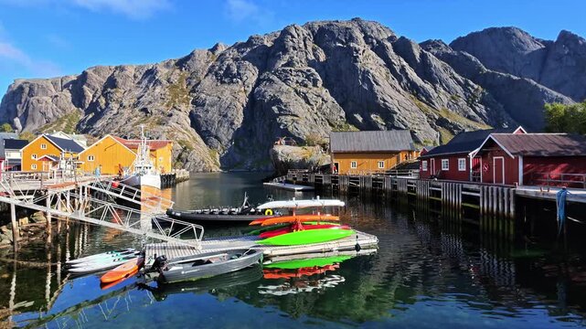 View over the historic harbor of Nusfjord in the Lofoten Islands. Tranquility and tradition in a Norwegian fishing harbor