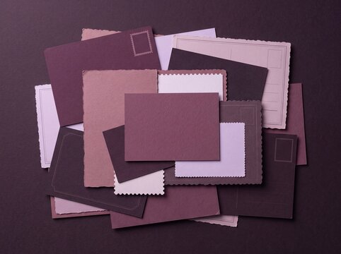 Vintage purple stationery and postcard flat lay arrangement