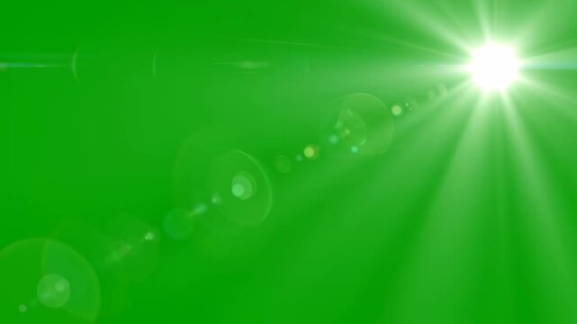 Radiant sun lens flare overlay on green screen