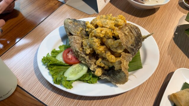 Fried Gourami with Salted Egg Sauce