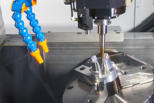 High precision metal parts cutting process on a 5-axis CNC milling machine with a ball nose end mill
