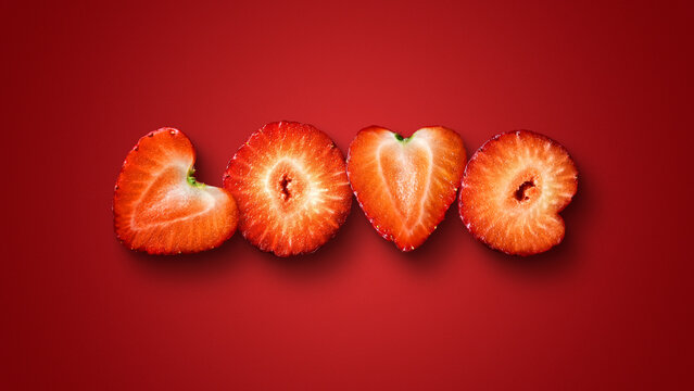 Heart-shaped strawberry slices arranged as a sweet Valentine symbol