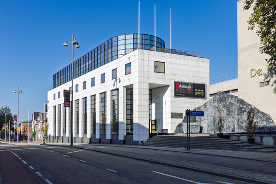 Heerlen, Netherlands - October 04, 2026: Exterior of De Nieuwe Galerij white modern building housing art exhibition spaces along city street.