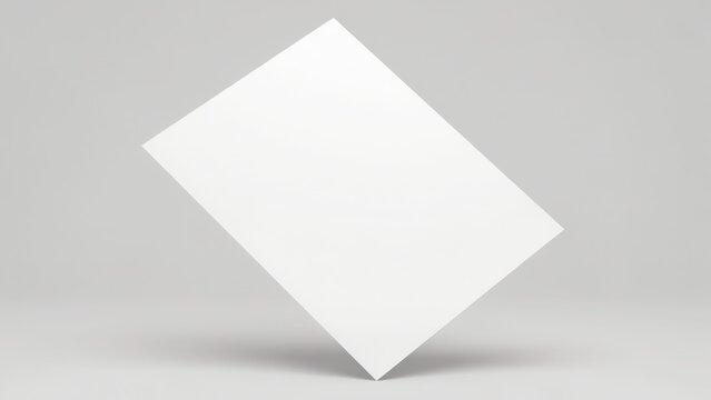 Blank white paper sheet floating diagonally in studio lighting. Perfect corporate branding mockup template for graphic designers.