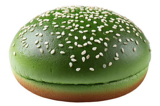 A single green burger bun topped with sesame seeds bread roll sandwich bun food ingredient vegetable bread artisan bread