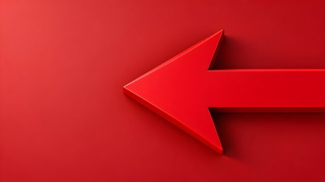 Minimalist sculpted 3d red arrow pointing left on a solid crimson background for bold graphic navigation