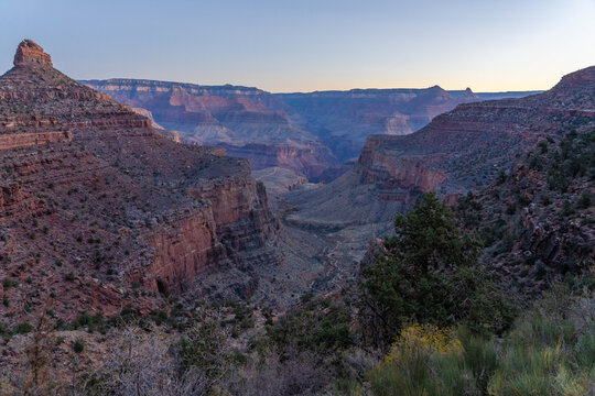 Sunrise in the Grand Canyon Looking Down Towards the Bright Angel Train in Arizona National Park.
