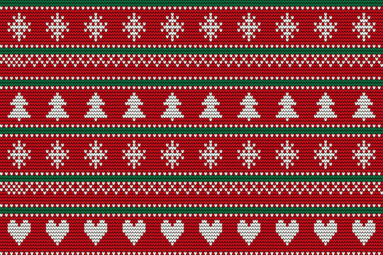 Nordic knitted Christmas sweater seamless pattern in red, white and green