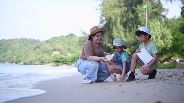 Group of teacher and school children on ecotourist trip and binoculars learning show beach take care of environment.