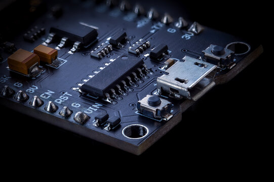 Wifi development board micro USB port close-up on black background electronics prototyping and internet of things hardware engineering components