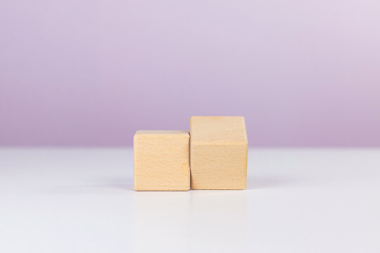 Two wooden blocks with one flipping cube for change concept