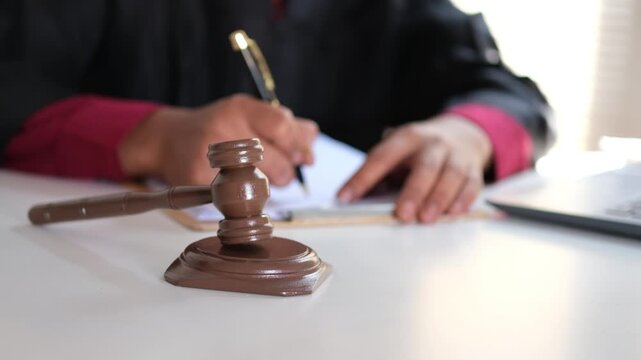 Lawyers or advocates signing consent documents, concepts of justice, corporations, justice and rights, insurance, courts and authorities. World Justice Day

