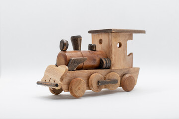 Wooden handmade toy train or locomotive with a simple rustic design © Muhammad Azhar