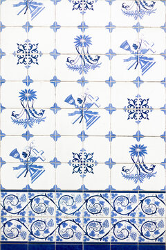 Vintage blue and white tile ceramic background. Traditional floral majolica mosaic design. Church of Santa Marinha in Cortegaca.