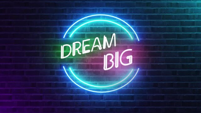 Dream big neon sign glowing circular lights on brick wall background motivational inspirational quote