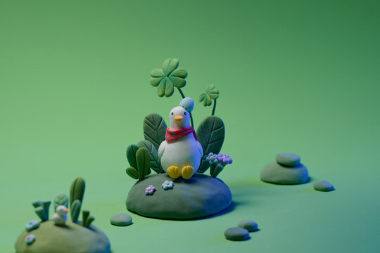 Cute Duck Figurine Sitting in a Tranquil Garden Setting