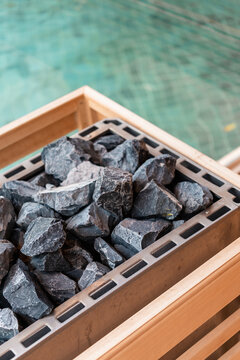 Sauna Rocks in a Sauna by a Swimming Pool