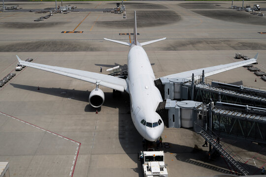 Commercial Passenger Aircraft Parked at Airport Gate