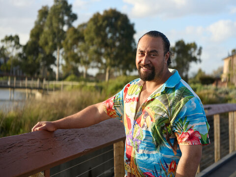 Portrait of Proud Pacific Islander Man Wearing Happy Tropical Clothing