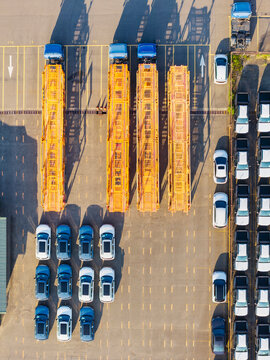Aerial View of Car Carrier Trucks at Logistics Yard