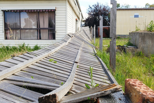 Wooden Fence Fallen Down Due To Storm Damage