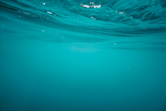 calm blue-green freshwater background underwater