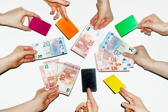 Various payment methods: hands holding cash money & debit credit cards