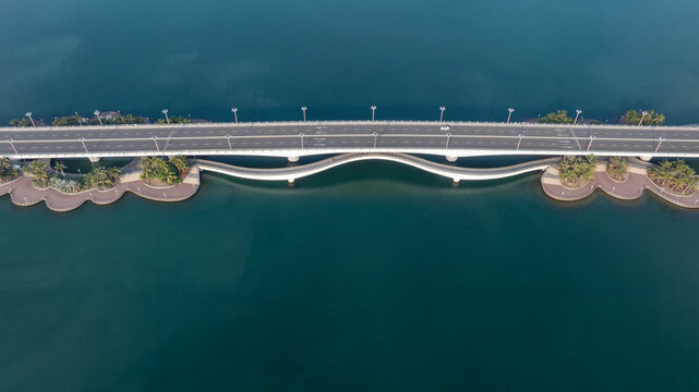 Aerial top‑down view of modern coastal sea bridge