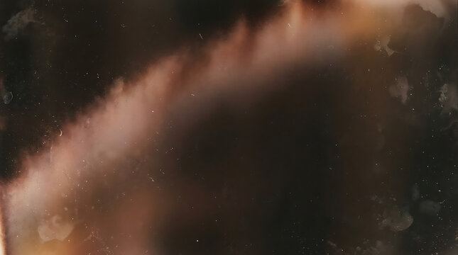 A close up view of a human hand reaching out against a dark and moody textured background setting