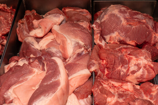 Raw meat cuts on a butcher counter in Da Lat Vietnam
