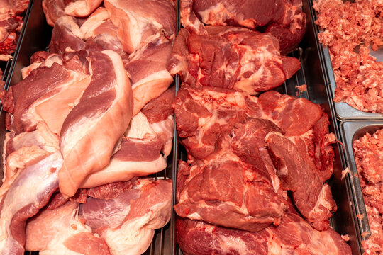 Raw meat cuts on a butcher counter in Da Lat Vietnam