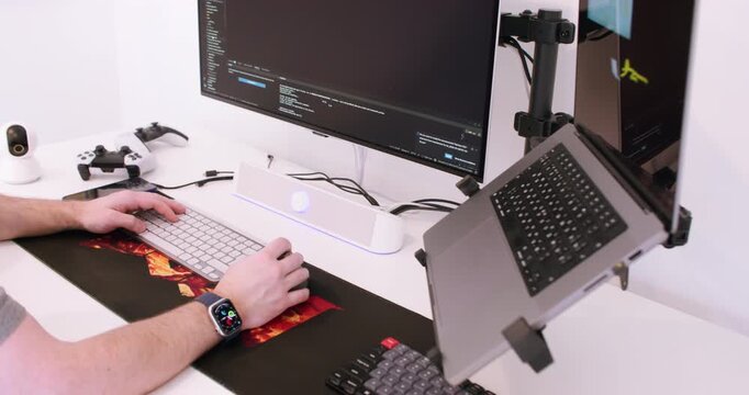 Developer workflow. Screening interface. Man hand analyzing application script code on modern computer technology in studio office.