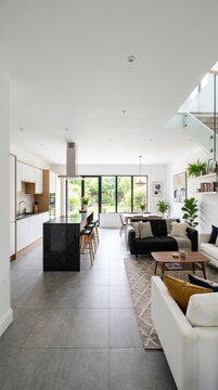 Modern open plan kitchen and living room contemporary interior design natural light elegant home